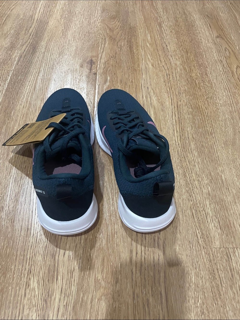 Nike Men's Black Sneakers with Pink Accent